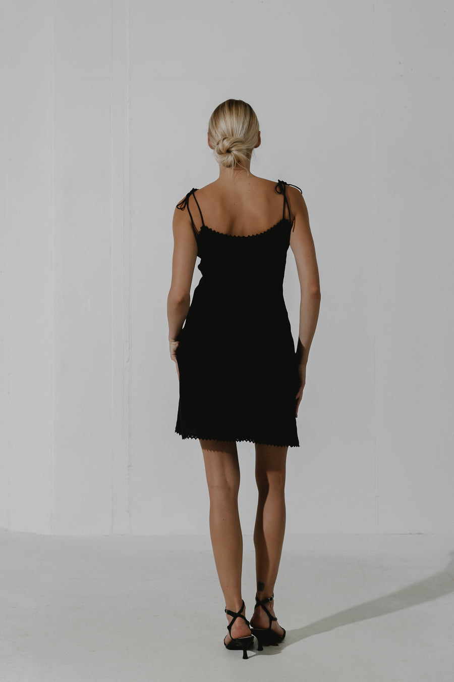 MAGNETITE Little black dress bias-cut design with adjustable shoulder straps