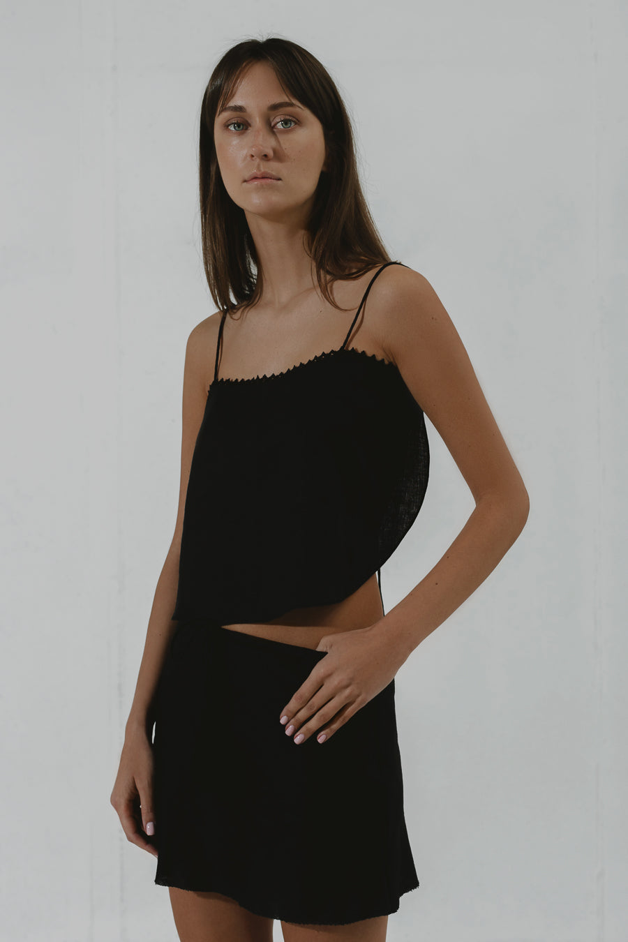 BLACK PEARL Bias-cut mini skirt with raw hem finish